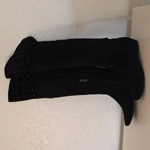 Black suede over the knee boots