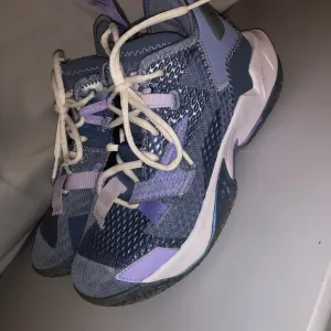 Blue and Purple Athletic Shoes with Breathable Design
