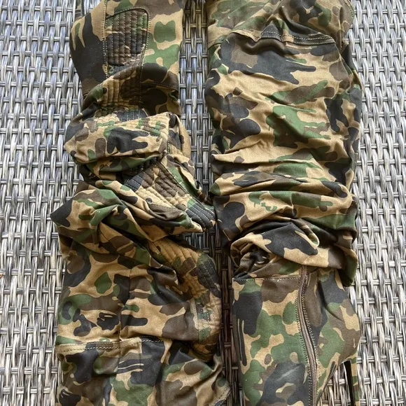 Edgy, trendy, urban camouflage slouchy, knee high boots. Strut your stuf…