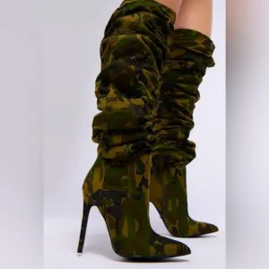 Edgy, trendy, urban camouflage slouchy, knee high boots. Strut your stuf…