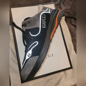 Gucci Black and Gray Sneakers with Modern Design