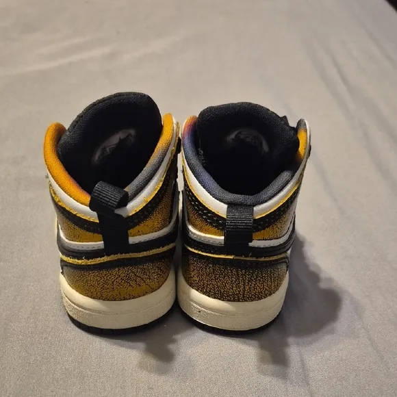 Jordan Black and Gold Classic High-Top Sneakers