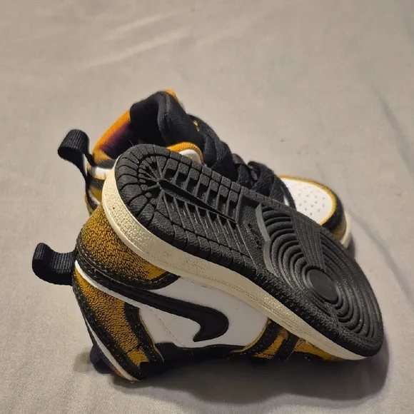 Jordan Black and Gold Classic High-Top Sneakers
