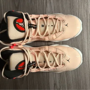 Jordan Cream and Black High-Top Sneakers