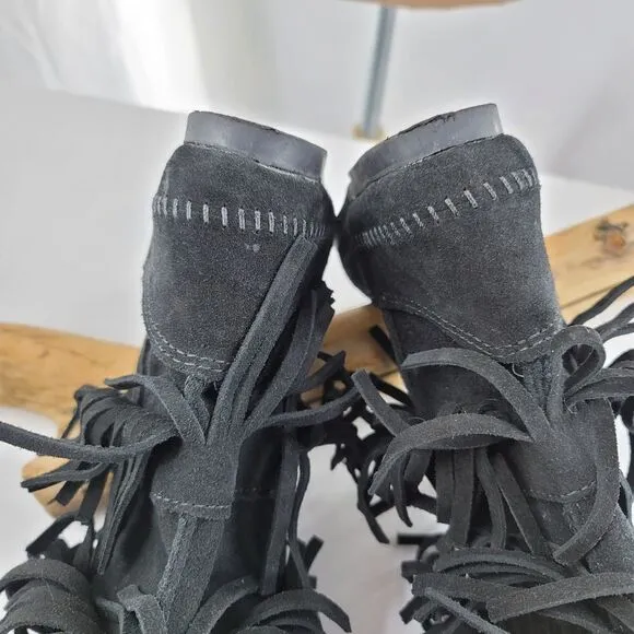 Minnetonka black fringed moccasin boots