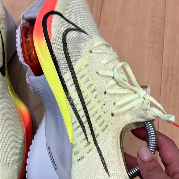 Nike Black and Yellow Sneakers with Dynamic Design