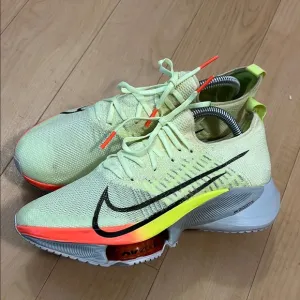 Nike Black and Yellow Sneakers with Dynamic Design