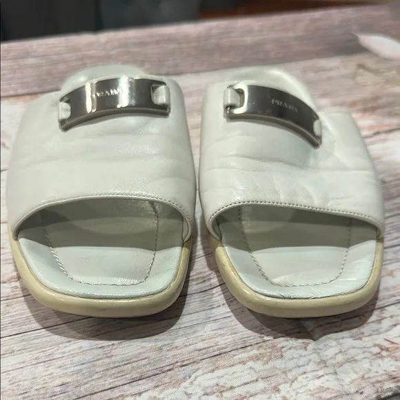 Prada Sz 6 White Leather Slide Sandals with Metallic Signature Name Plate