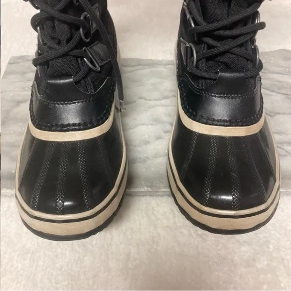 Sorel Size 7 Carnival Winter Boots Lace Up Black White Faux Fur