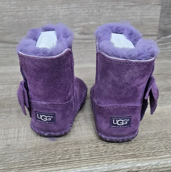 Ugg kids purple suede boots with side bows size 2/3 toddler new in box