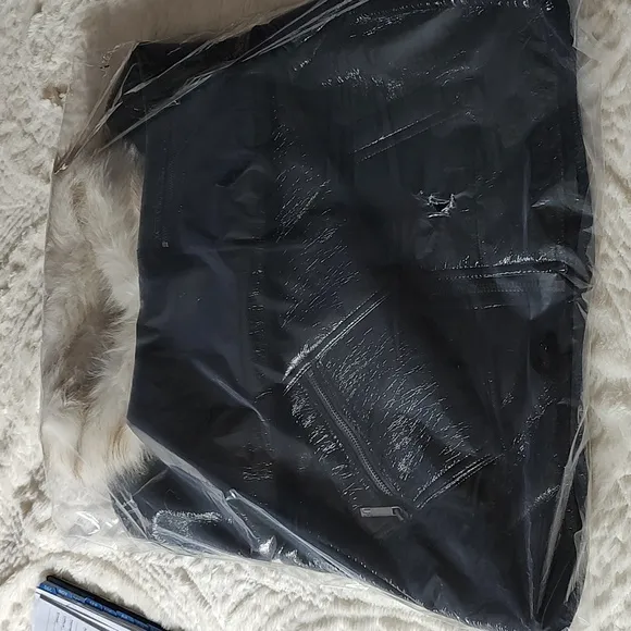 Unreal fur wet look aviator jacket