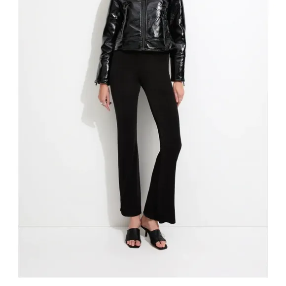 Unreal fur wet look aviator jacket